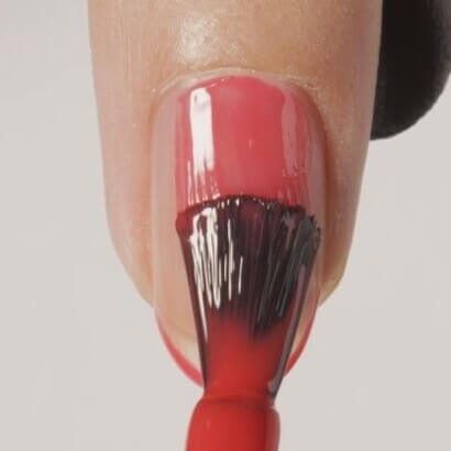 Polish nails in thin layers with CND™ SHELLAC™