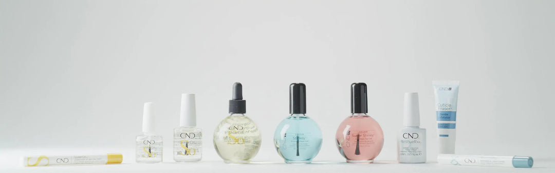 A row of popular CND Treatments including SolarOil Pen, SolarOil bottles, Stickey, Super Shiney, RescueRXx, and Cuticle Oil on a light gray background